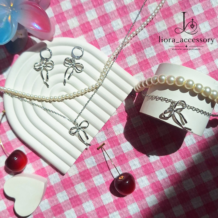 ست پاپیون مرواریدی (گردنبند، دستبند و گوشواره)